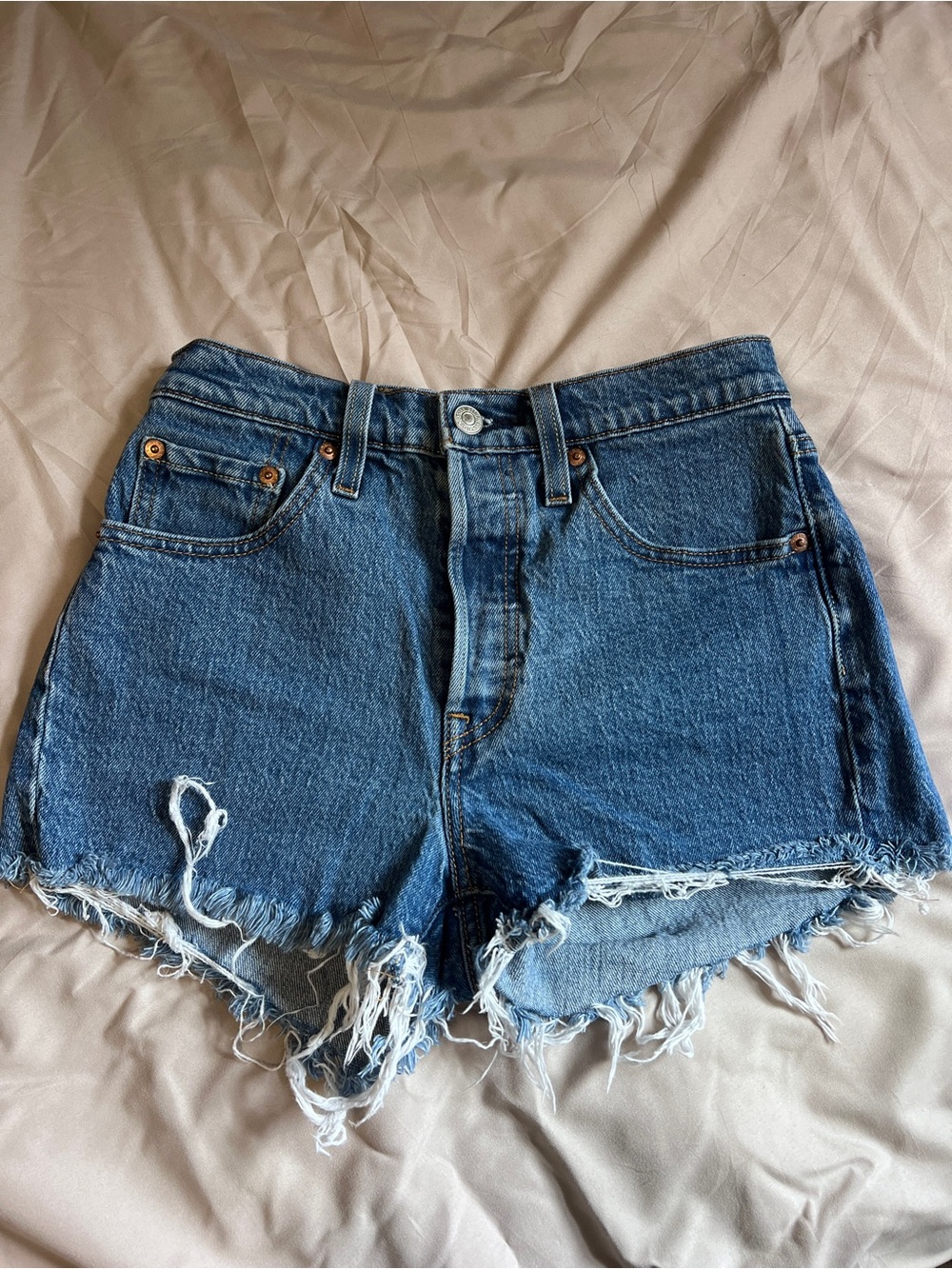 Levi's Distressed Blue High-Rise Denim Cutoff Shorts